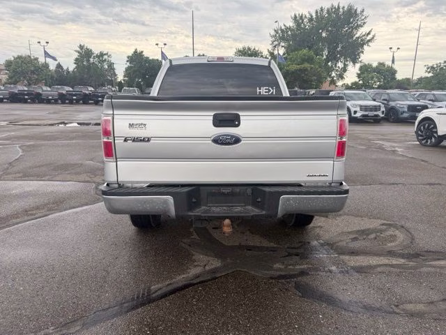 Used 2014 Ford F-150 XLT with VIN 1FTFW1EF8EFA31836 for sale in Bismarck, ND