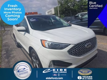 2023 Star White Metallic Tri-Coat Ford Edge SEL AWD SUV