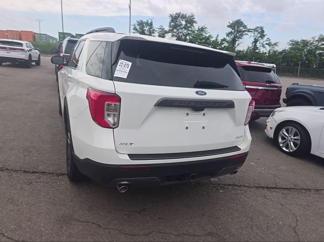 2023 Star White Metallic Tri-Coat Ford Explorer XLT 4X4 SUV