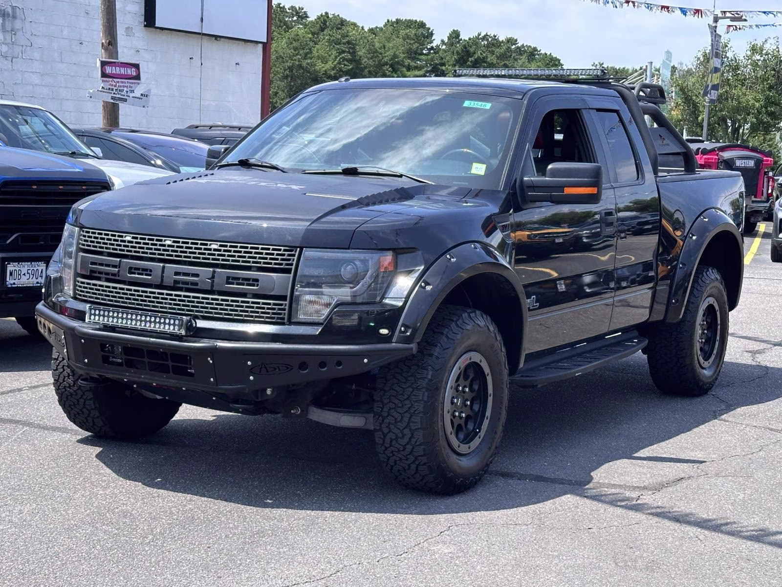 2014 Tuxedo Black Metallic Ford F-150 4WD SuperCab 133 SVT Raptor 4X4 Truck