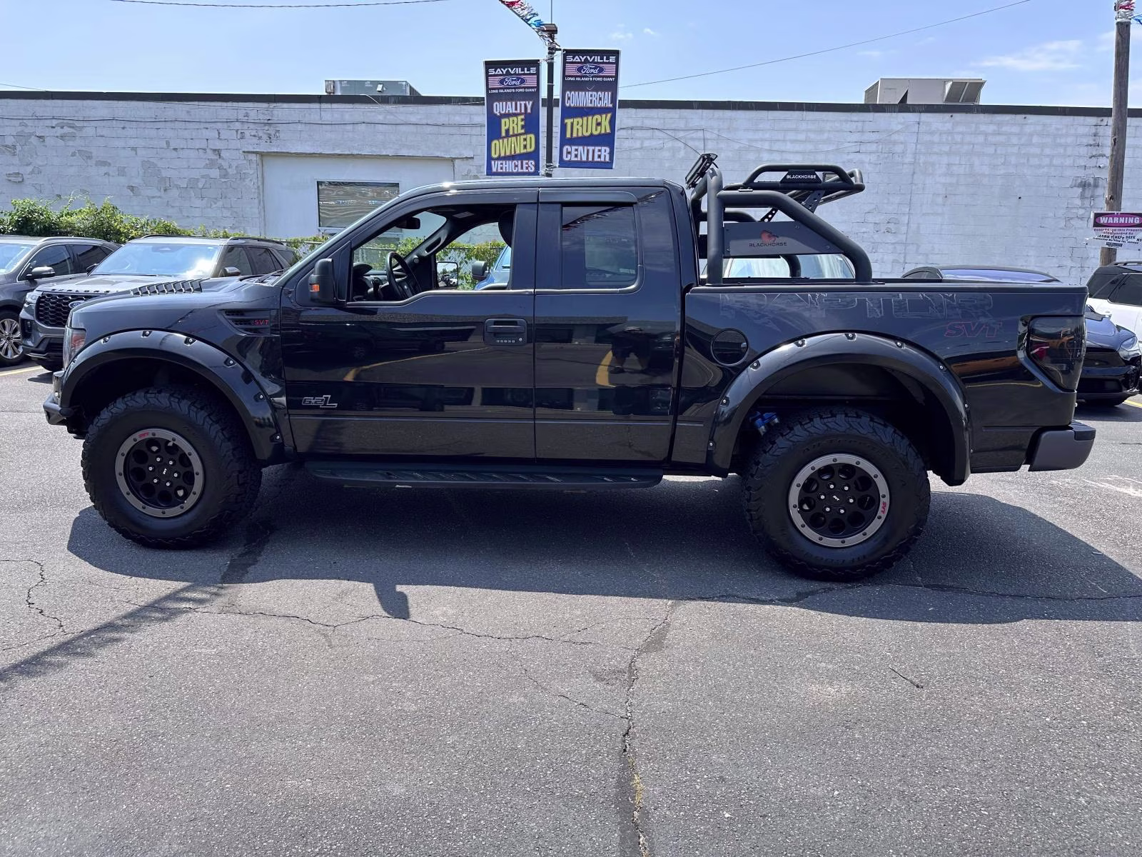 2014 Tuxedo Black Metallic Ford F-150 4WD SuperCab 133 SVT Raptor 4X4 Truck