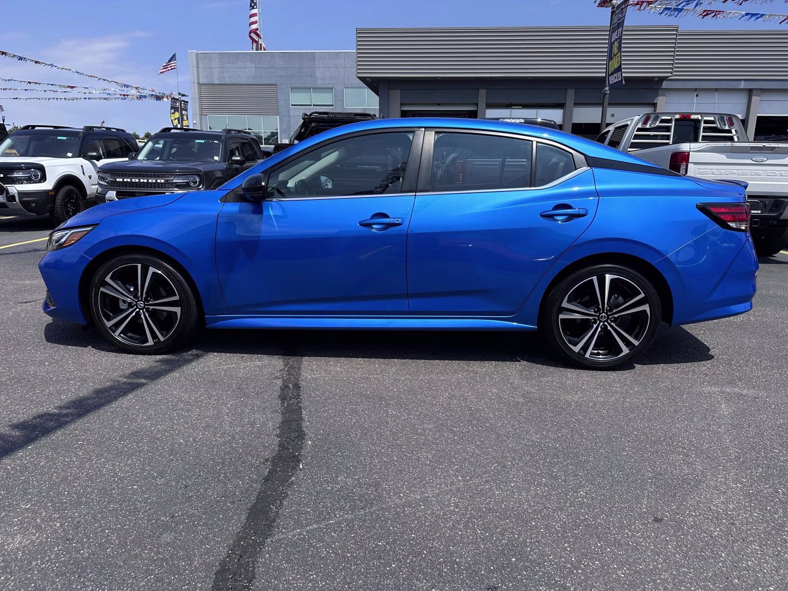 2023 Electric Blue Metallic Nissan Sentra SR CVT FWD Sedan