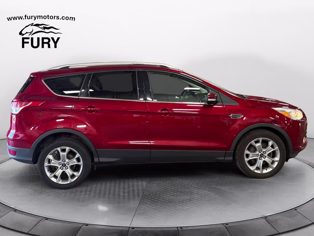 Used 2014 Ford Escape Titanium with VIN 1FMCU0JXXEUE12922 for sale in Forest Lake, Minnesota