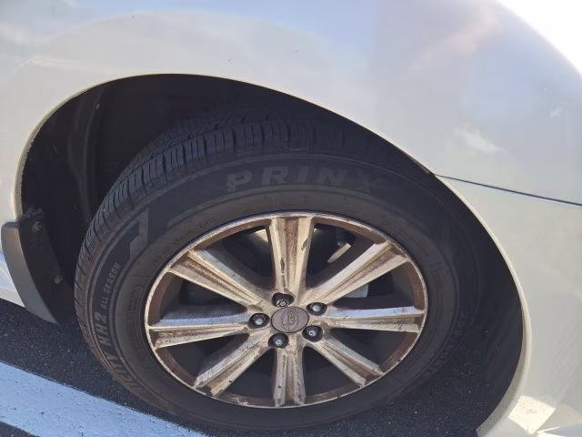2010 Satin White Pearl Subaru Legacy 2.5i AWD Sedan