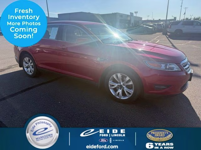 2010 Red Ford Taurus SEL FWD Sedan