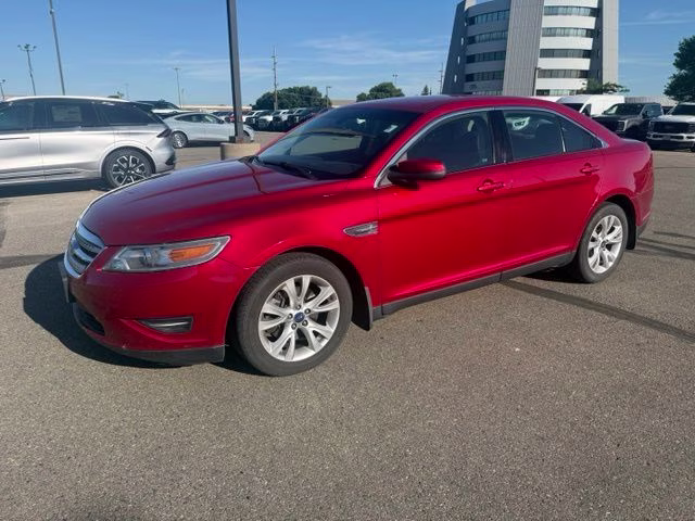 2010 Red Ford Taurus SEL FWD Sedan