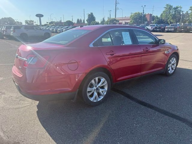 2010 Red Ford Taurus SEL FWD Sedan