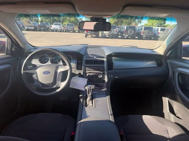 2010 Red Ford Taurus SEL FWD Sedan