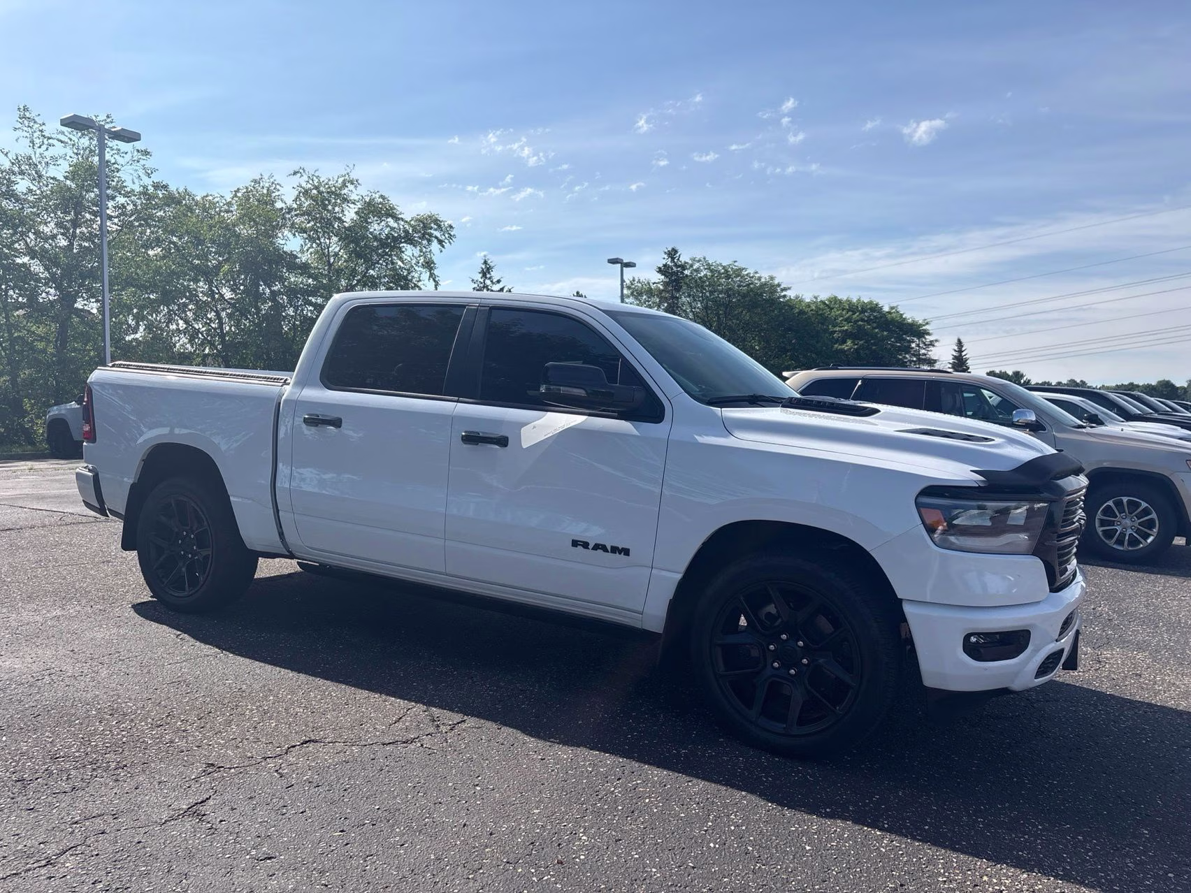 2023 Bright White Clearcoat Ram 1500 Laramie 4X4 Truck