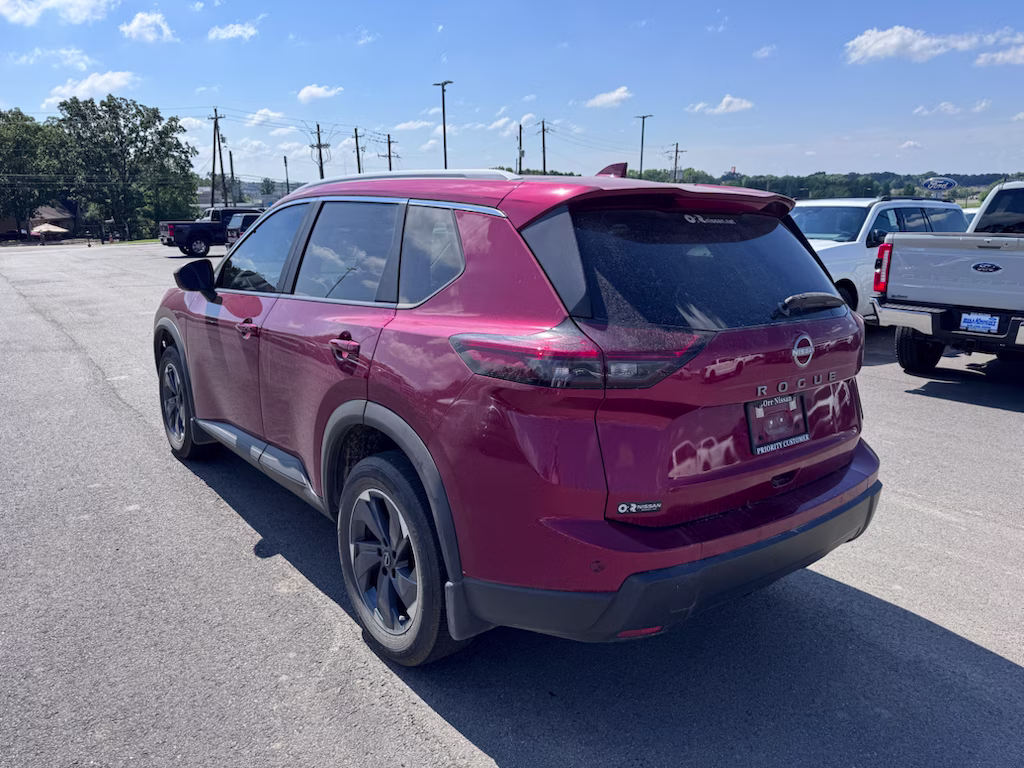 2026 Scarlet Ember Tintcoat Nissan Rogue SV FWD SUV