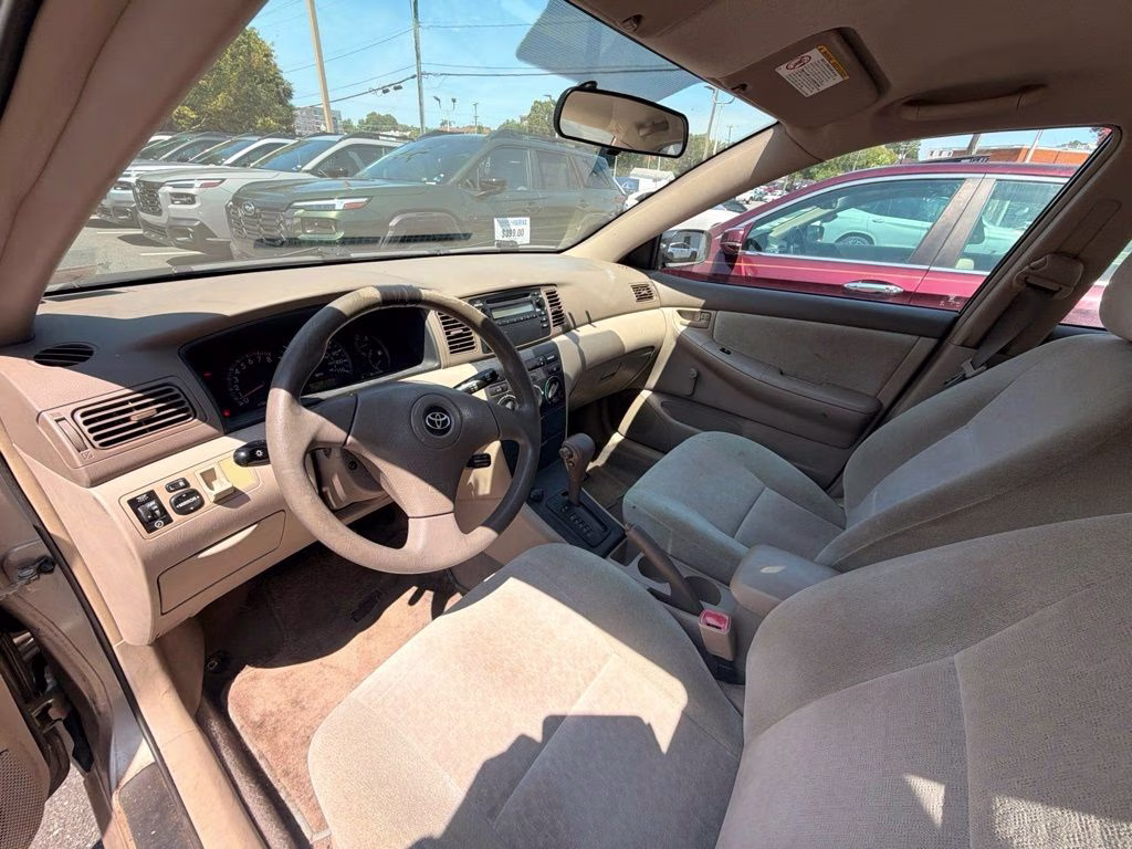 2004 Beige Toyota Corolla CE FWD Sedan