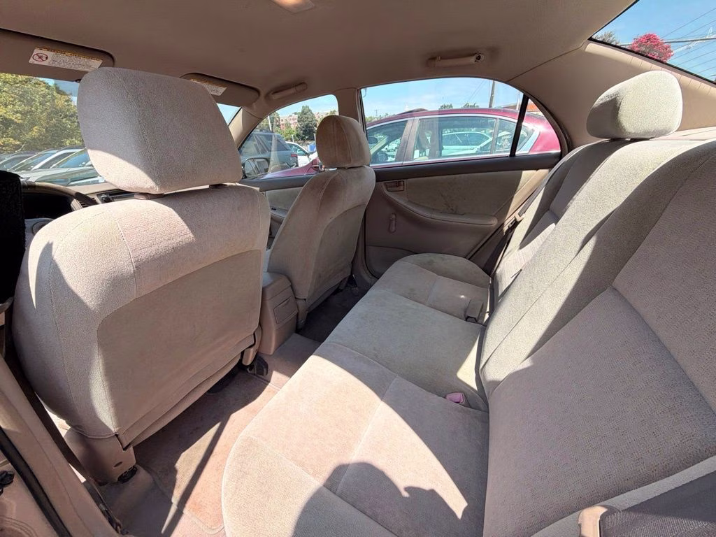 2004 Beige Toyota Corolla CE FWD Sedan