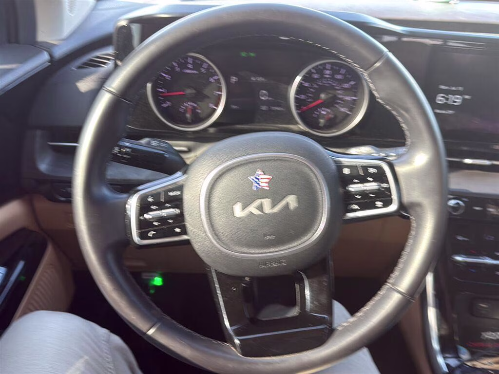 2023 Astra Blue Kia Carnival EX FWD Van