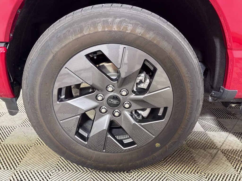 2025 Rapid Red Metallic Tinted Clearcoat Ford F-150 Lightning Flash AWD Truck