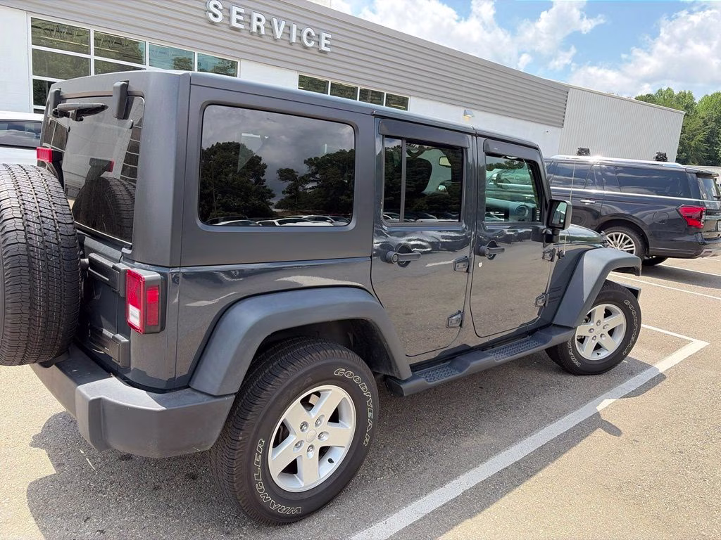 2016 Rhino Clearcoat Jeep Wrangler Unlimited Sport 4X4 SUV
