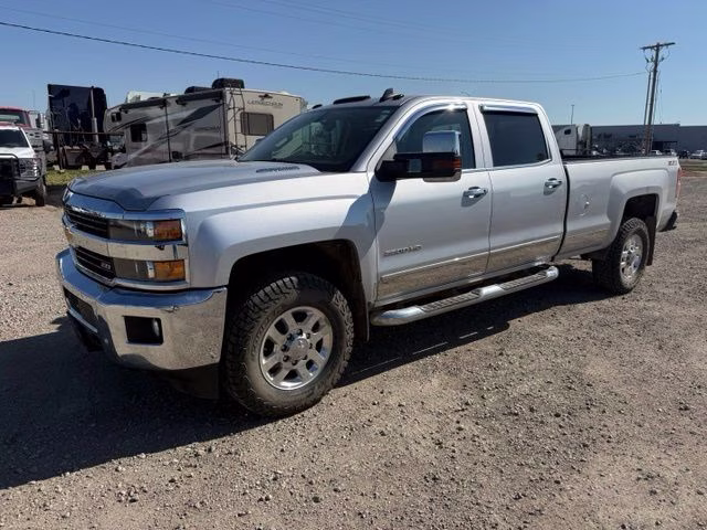 2015 Silver Ice Metallic Chevrolet Silverado 3500HD LTZ 4X4 Truck