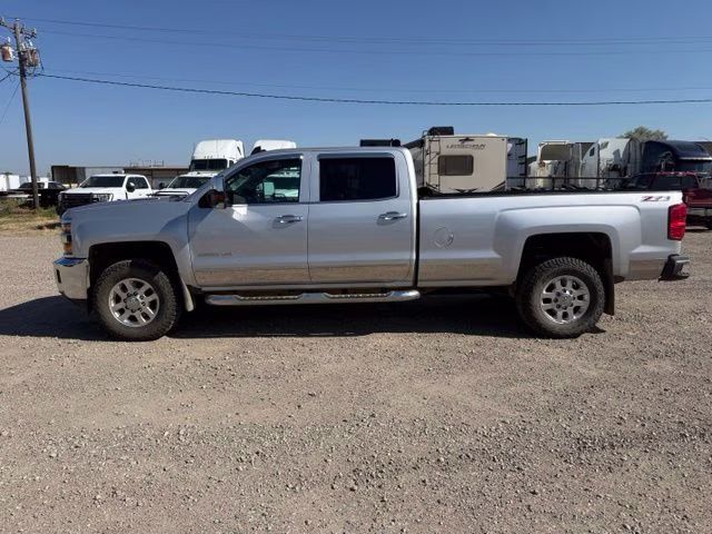 2015 Silver Ice Metallic Chevrolet Silverado 3500HD LTZ 4X4 Truck