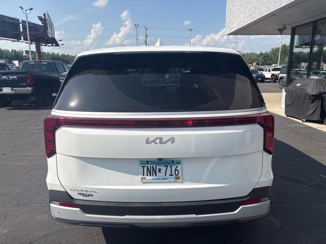 2025 Snow White Pearl Kia Carnival LX FWD Van