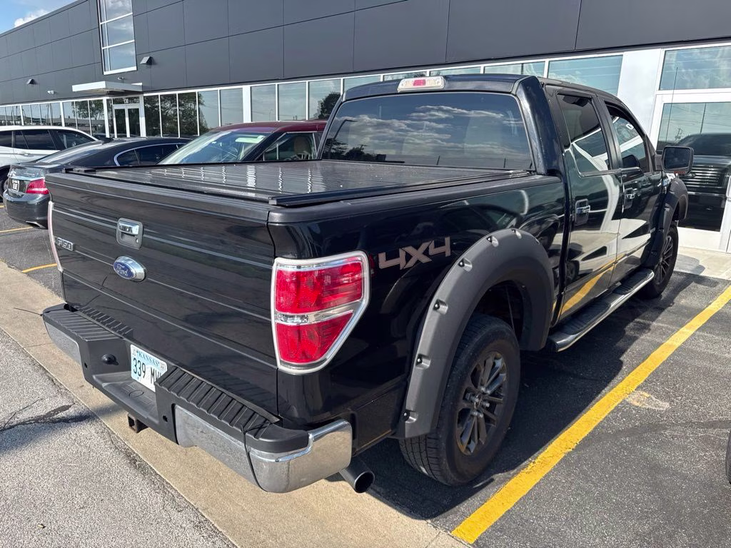 2012 Tuxedo Black Metallic Ford F-150 XLT 4X4 Truck