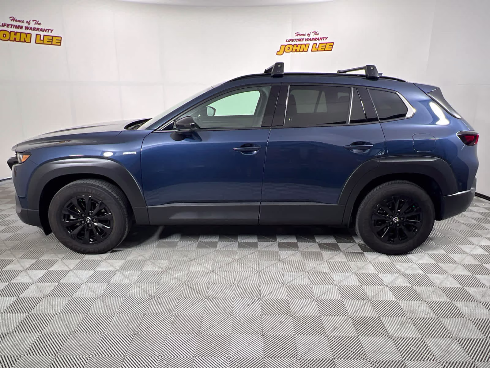 2025 Ingot Blue Metallic Mazda CX-50 Hybrid Premium Package AWD