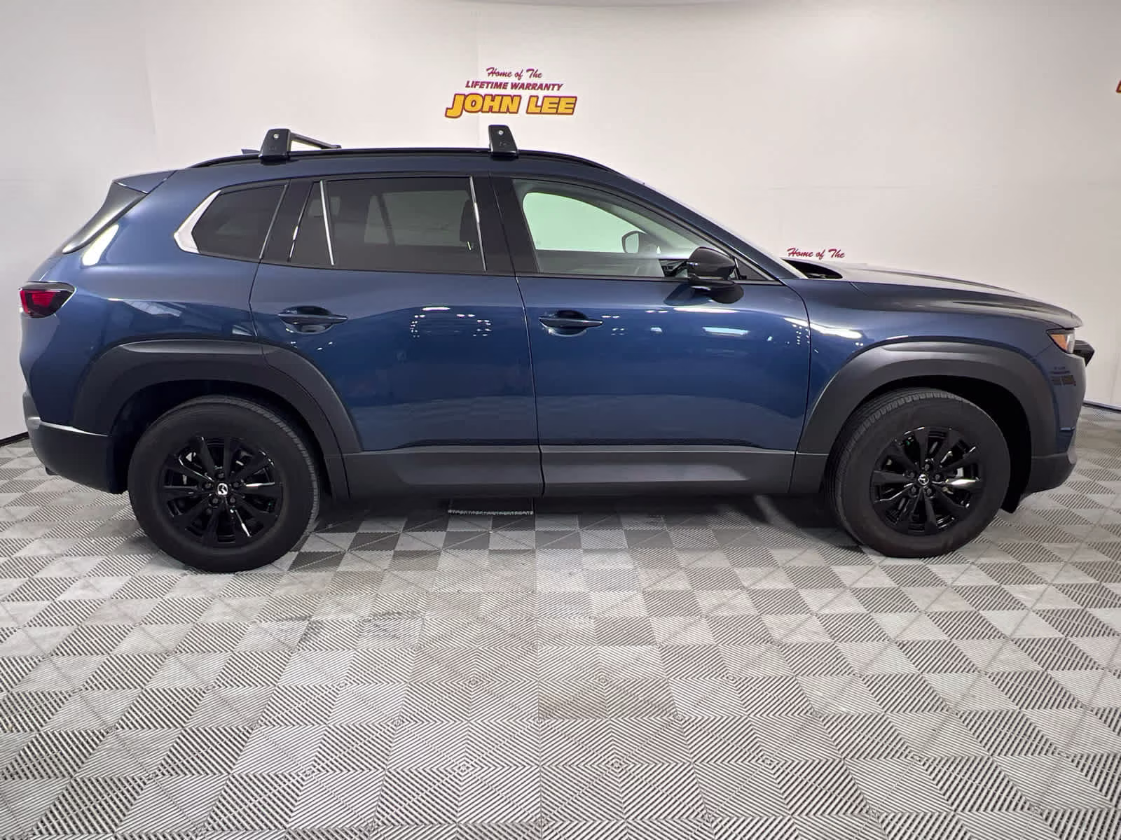 2025 Ingot Blue Metallic Mazda CX-50 Hybrid Premium Package AWD