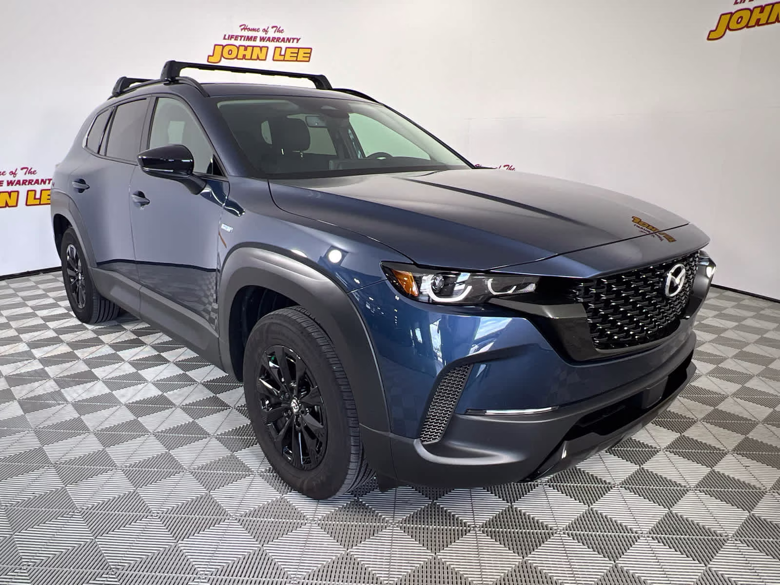 2025 Ingot Blue Metallic Mazda CX-50 Hybrid Premium Package AWD