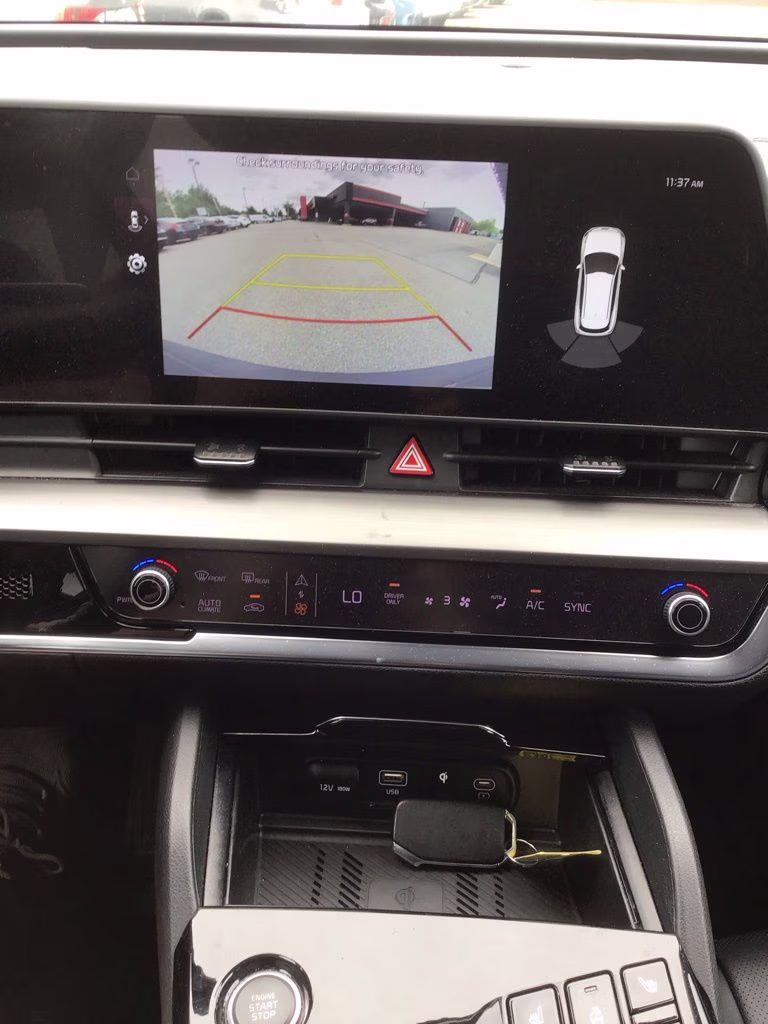 2023 Fusion Black Kia Sportage Hybrid EX AWD SUV