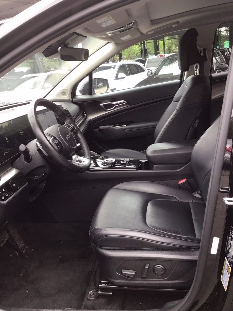 2023 Fusion Black Kia Sportage Hybrid EX AWD SUV