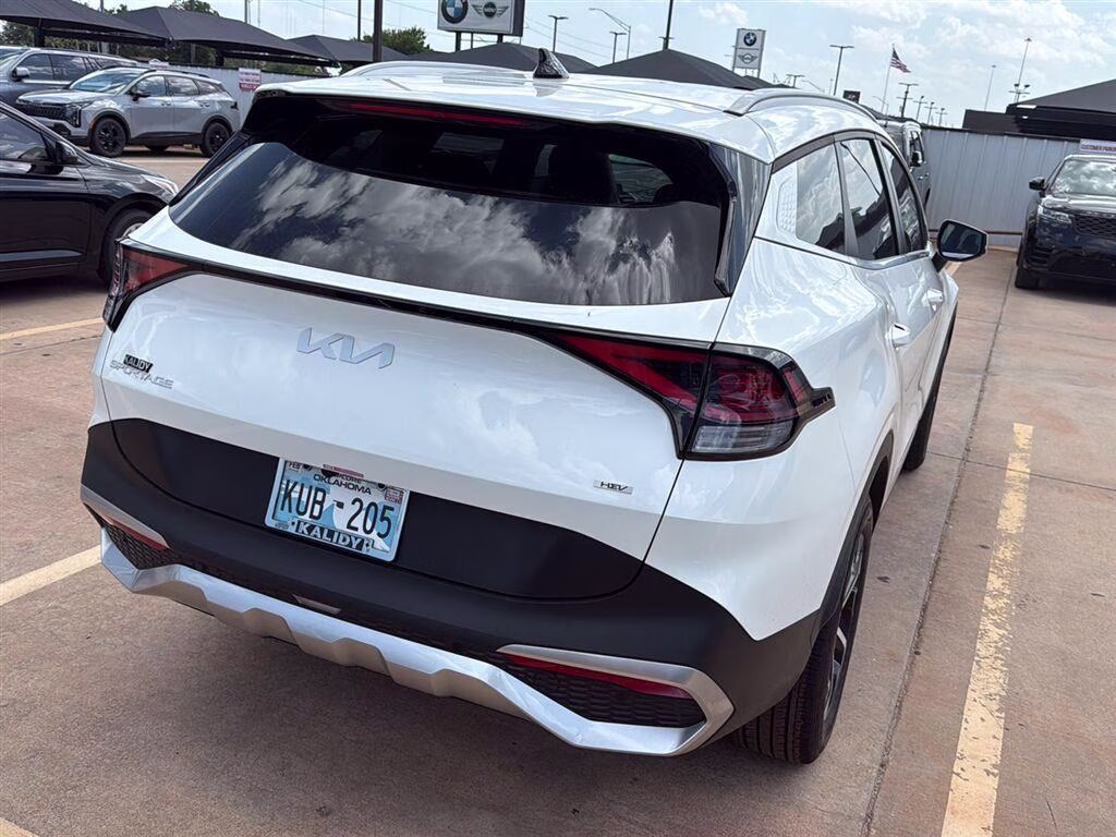 2025 Snow White Pearl Kia Sportage Hybrid EX AWD SUV