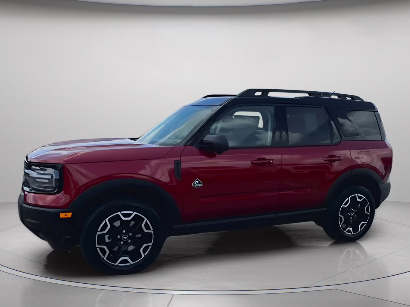 2025 Ruby Red Metallic Tinted Clearcoat Ford Bronco Sport Outer Banks 4X4 SUV