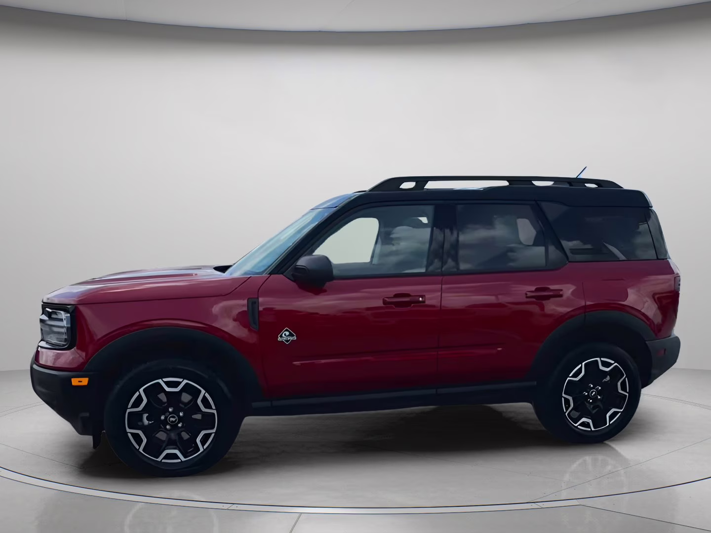 2025 Ruby Red Metallic Tinted Clearcoat Ford Bronco Sport Outer Banks 4X4 SUV