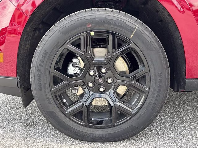2025 Ruby Red Metallic Tinted Clearcoat Ford Maverick XLT AWD Truck
