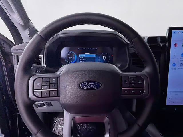 2025 Antimatter Blue Metallic Ford F-150 Lightning Flash AWD Truck