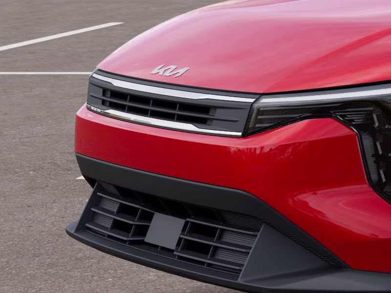 2025 Currant Red Kia K4 LXS FWD Sedan