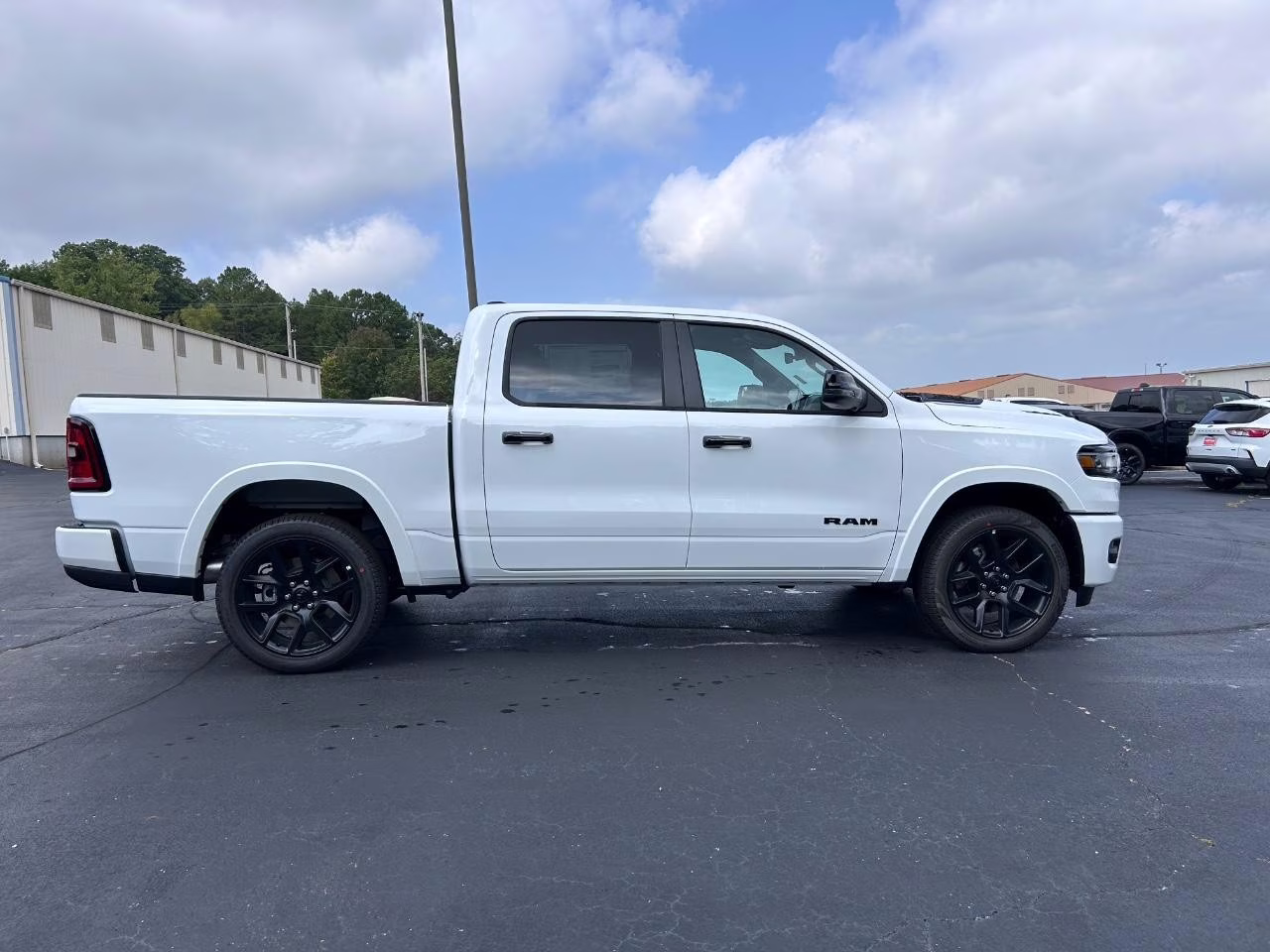 2026 Bright White Clearcoat Ram 1500 Laramie 4X4 Truck