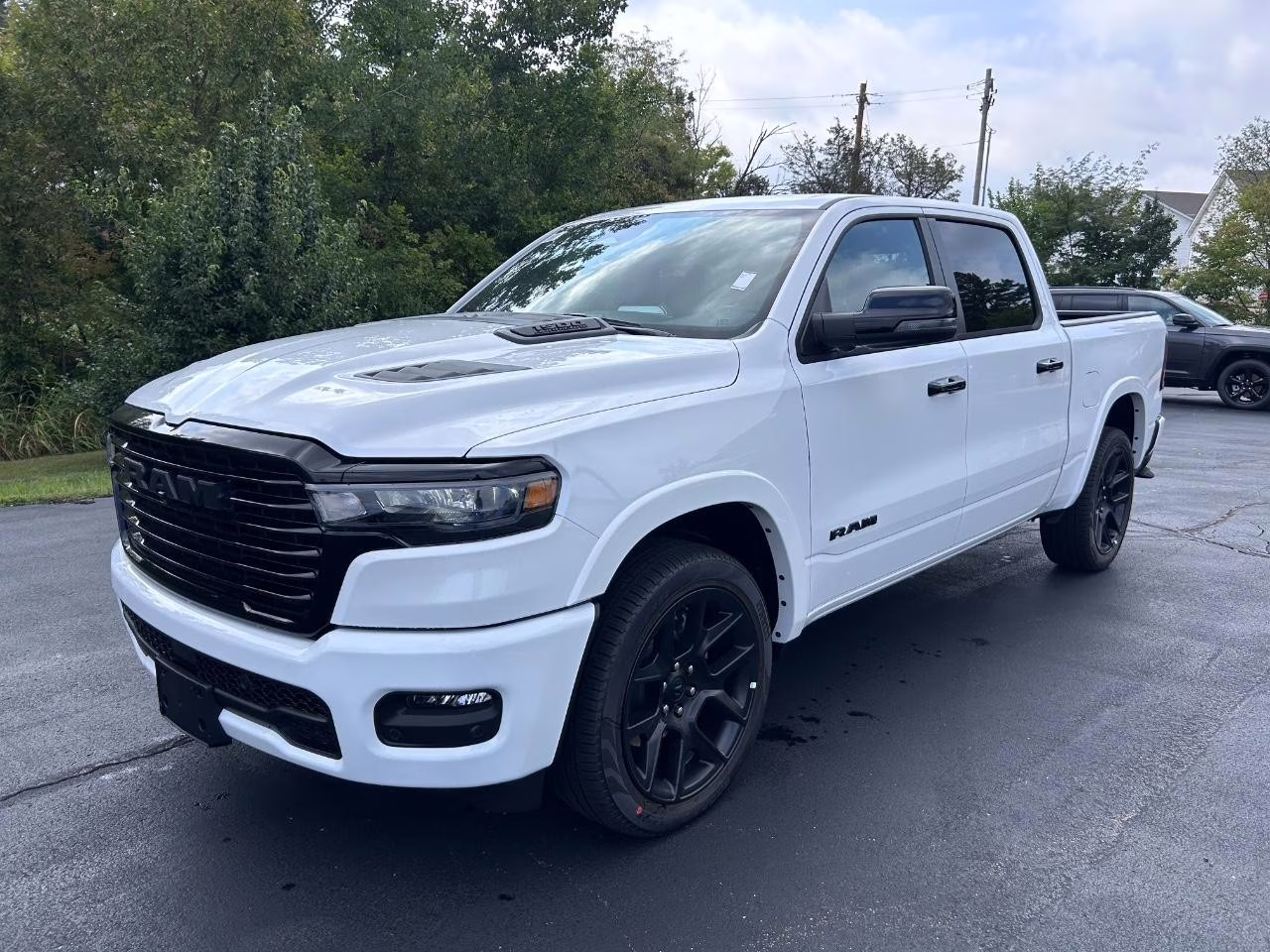 2026 Bright White Clearcoat Ram 1500 Laramie 4X4 Truck