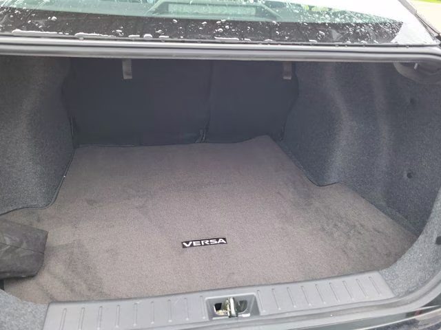 2025 Super Black Metallic Nissan Versa 1.6 SV FWD Sedan