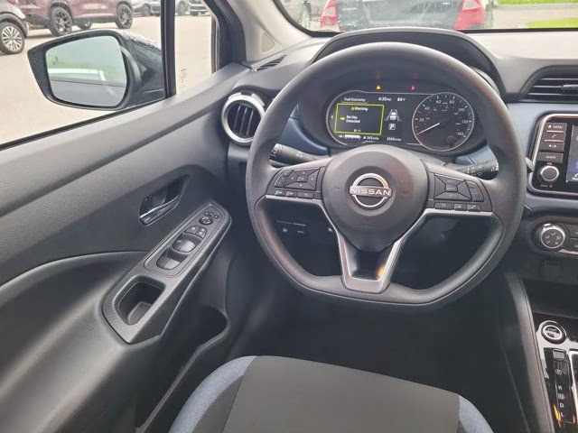 2025 Super Black Metallic Nissan Versa 1.6 SV FWD Sedan