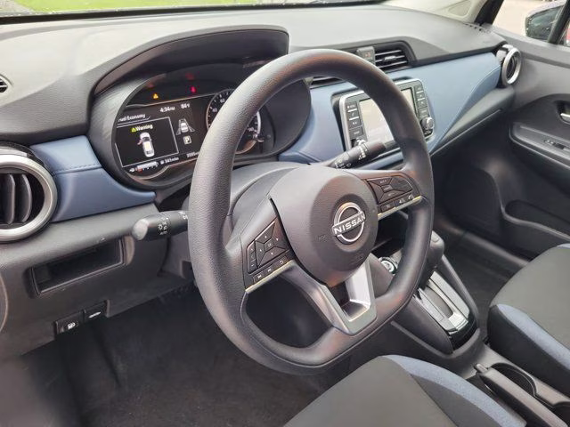 2025 Super Black Metallic Nissan Versa 1.6 SV FWD Sedan