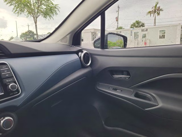 2025 Super Black Metallic Nissan Versa 1.6 SV FWD Sedan