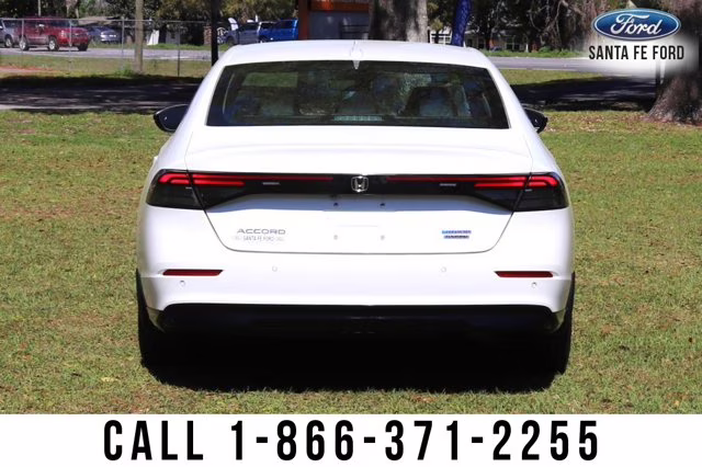 2024 White Honda Accord Hybrid Touring FWD Sedan