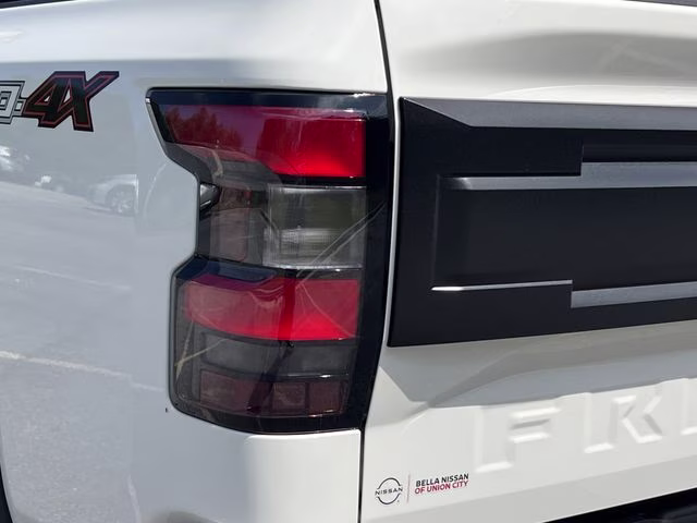 2026 Glacier White Nissan Frontier PRO-4X 4X4 Truck