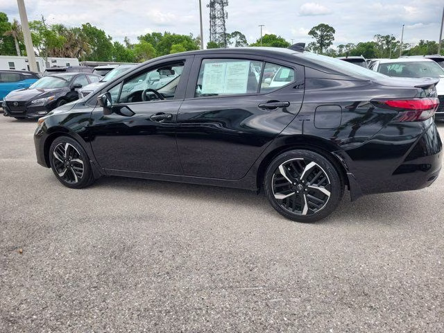 2025 Super Black Metallic Nissan Versa 1.6 SR FWD Sedan