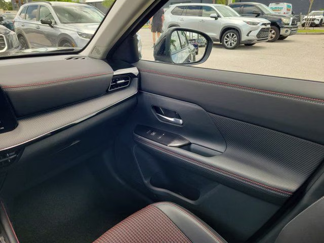 2026 Gun Metallic/Super Black Nissan Kicks SR FWD SUV