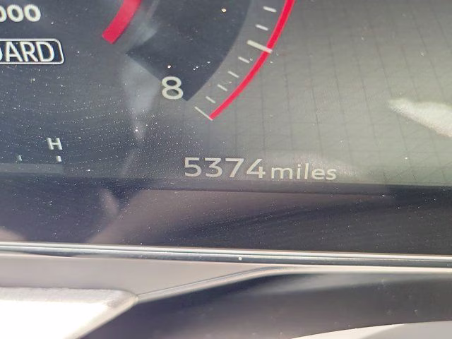 2026 Gun Metallic/Super Black Nissan Kicks SR FWD SUV