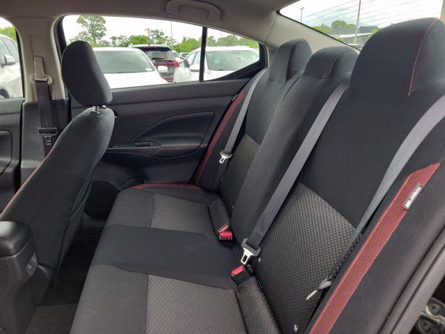 2025 Super Black Metallic Nissan Versa 1.6 SR FWD Sedan