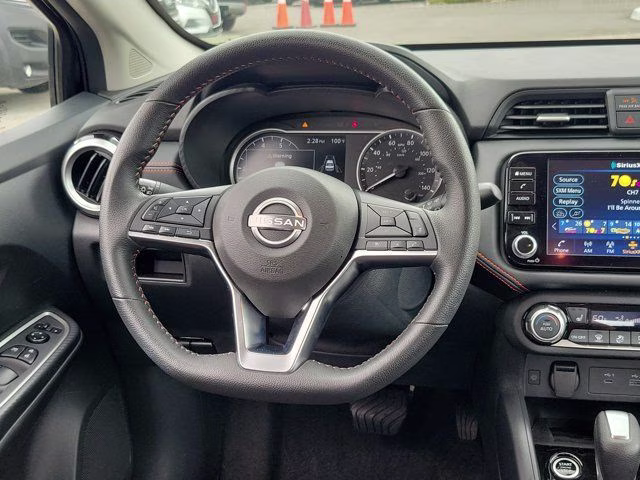 2025 Super Black Metallic Nissan Versa 1.6 SR FWD Sedan