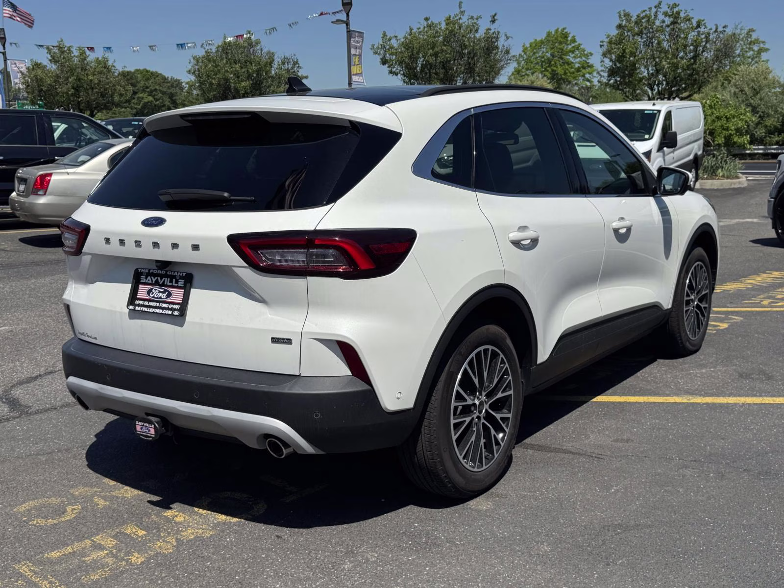 2023 Star White Metallic Tri-Coat Ford Escape PHEV FWD FWD SUV