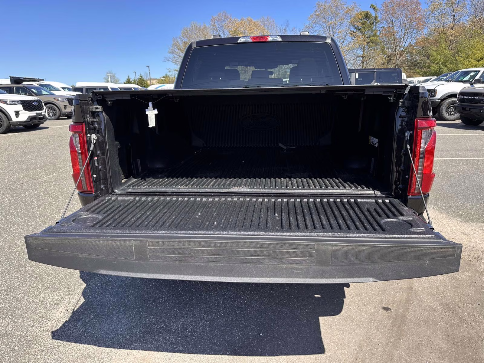2025 Agate Black Metallic Ford F-150 STX 4WD SuperCrew 5.5' Box 4X4 Truck