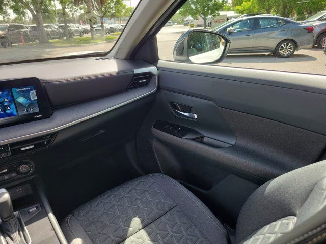 2026 Aspen White Tricoat Nissan Kicks SV FWD SUV